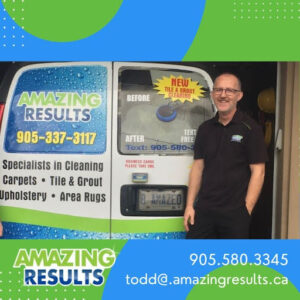 Amazing Results owner, Todd, standing to the right of an Amazing Results Carpet and Upholstery Cleaning truck.